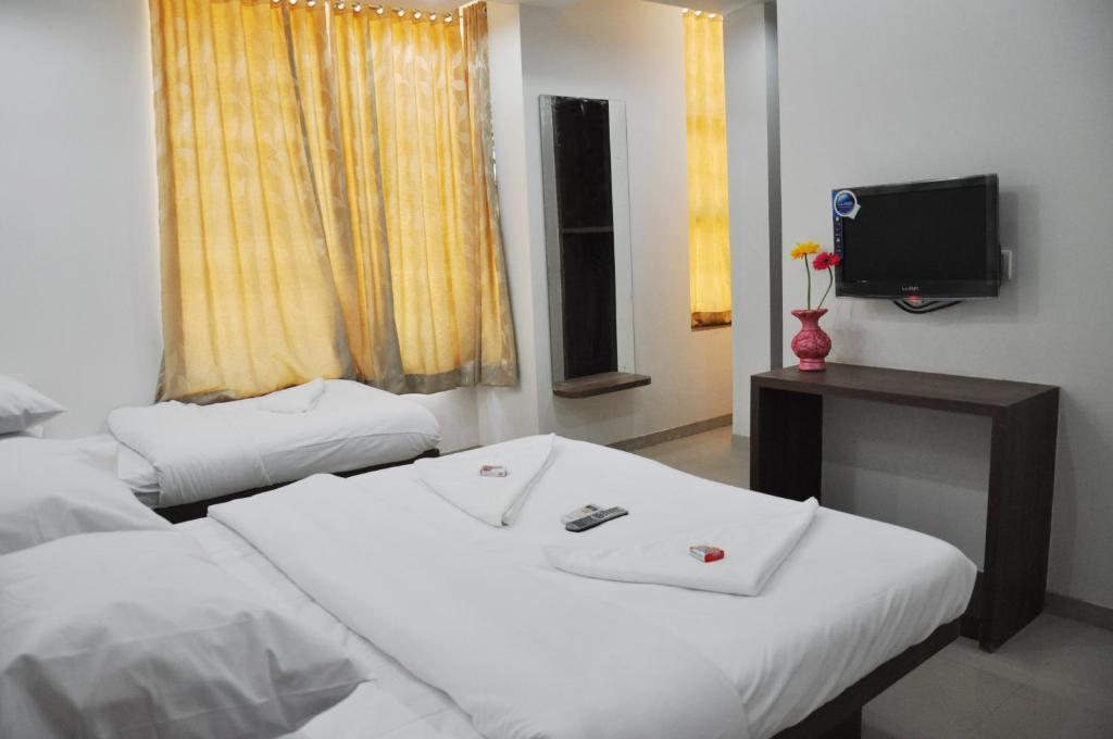 Sai Srushti Hotel Shirdi Værelse billede